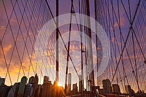 Brooklyn Bridge sunset with Manhattan skyline US