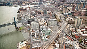 Brooklyn and Manhattan Bridges aerial view from helicopter, New York City. City skyline from a high vantage point - NY - USA