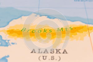 Brooks Mountains in Focus on a Tilted World Map.