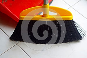 Broom and dustpan to sweep