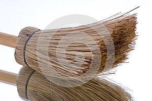 Broom over mirror