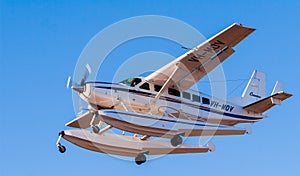 Broome, WA., Australia - Jul 8, 2012: A Cessna 208 Caravan amphibious float plane lands at Broome International Airport after a