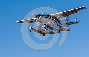 Broome, WA., Australia - Jul 8, 2012: A Cessna 208 Caravan amphibious float plane lands at Broome International Airport after a