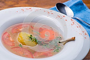 Broth with vegetables and meat