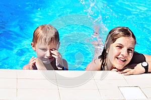 Brothe and sister in the pool