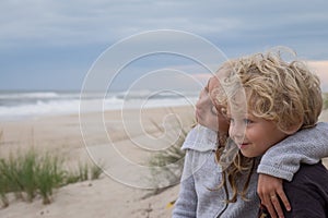 Brother and sister at beach