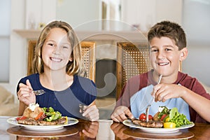 Brother And Sister Eating meal, mealtime Together