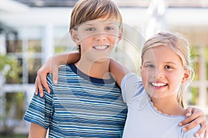 Brother and sister embracing