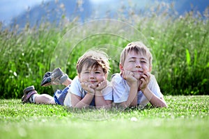 Brother and sister in grass