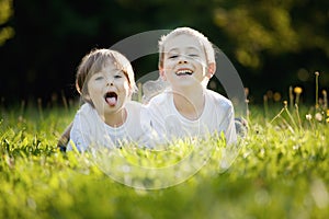 Brother and sister in grass