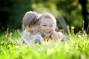 Brother and sister in grass