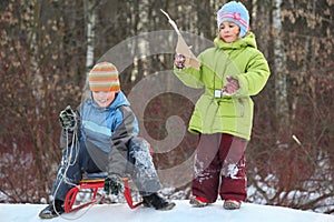 Brother and sister intend drive from hill