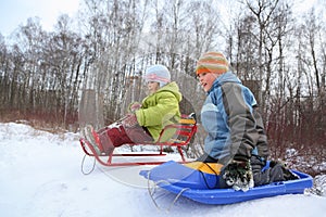 Brother and sister intend drive from hill