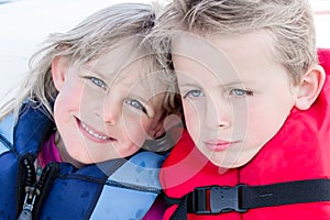 Brother and Sister in Life Jackets