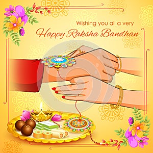 Brother and Sister tying rakhi on Raksha Bandhan