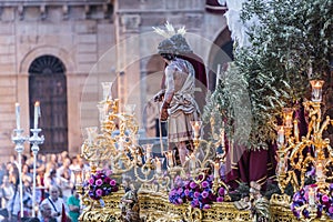 Brotherhood of Jesus corsage making station of penitence in front at the town hall, Linares, Jaen province, Andalusia, Spain photo