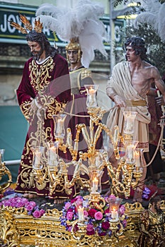 Brotherhood of Jesus corsage making station of penitence in front at the town hall, Linares, Jaen province, Andalusia, Spain