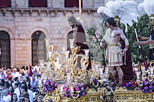 Brotherhood of Jesus corsage making station of penitence in front at the town hall, Linares, Jaen province, Andalusia, Spain