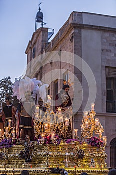 Brotherhood of Jesus corsage making station of penitence in front at the town hall, Linares, Jaen province, Andalusia, Spain