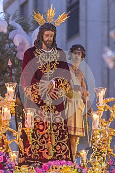 Brotherhood of Jesus corsage making station of penitence in front at the town hall, Linares, Jaen province, Andalusia, Spain