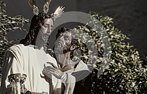 Brotherhood of the kiss of Judas, Holy Week in Seville, Spain photo