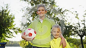 Brothers Bonding with Soccer Ball