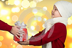The brothers exchange Christmas gifts.The hands of children with a gift.Merry Christmas and Happy Holidays!