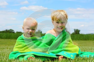 Brothers Wrapped in Beach Towel