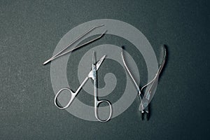 brow tweezer scissors and cuticle nipper. beauty kit. photo