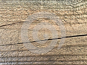 Brown aged rough wooden textured as a background