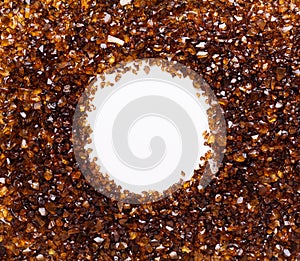 Brown Amber stones frame on white background