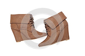 Brown ankle women boots on a white background
