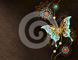 Brown background with turquoise butterfly