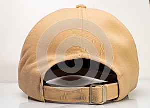 Brown baseball hat on a white background