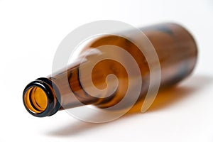 Brown beer bottle on a white background