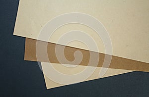 Brown beige black papers composition background design photo