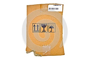 Brown and beige colored corrugated cardboard, warning signs, barcode.