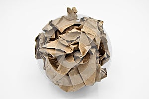 Brown and beige crumpled paper ball.