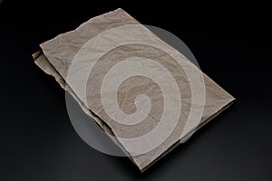 Brown and beige crumpled paper, cardboard.
