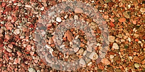 Brown beige little pebbles stone for background Beach water cooled