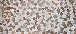 Brown beige natural pebble stone tile texture background banner, top view