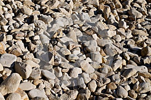 Brown beige rock pebbles stone for background Beach water arid