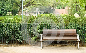 Brown bench with nobody in the park