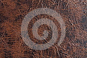 Brown and black artificial leather texture.