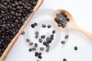 Brown and black roasted arabica coffee baens. mashed roasted coffee beans is ingredients of espresso, cappuccino, latte, mocha,