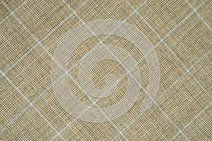 Brown and blue guncheck pattern on fabric.