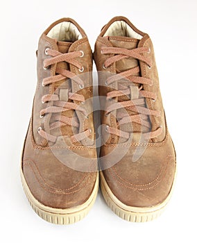 Brown boots on white background