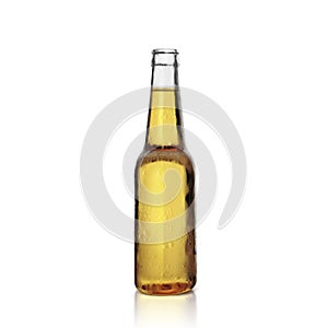 Brown bottle of fresh beer with drops of condensation on a white background. The bottle is uncovered and does not have a metal cap