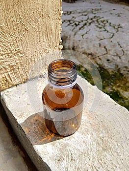 A brown bottle left side view