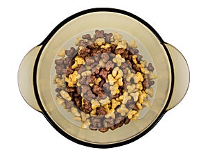 Brown bowl with breakfast cereals in form stars on white